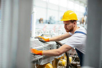 Portrait of man working in factory