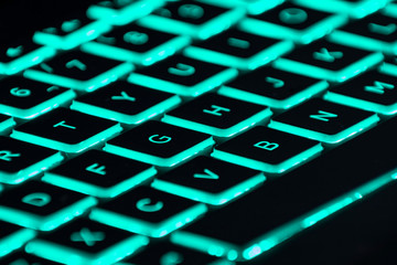 Close-up of a backlit gaming keyboard.