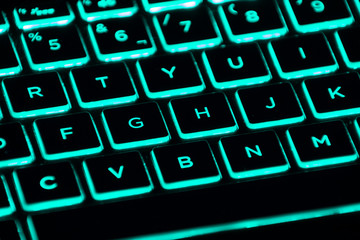 Close-up of a backlit gaming keyboard.