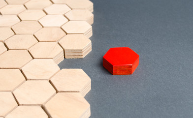 Red item is disconnected from other items. Hexagons. The concept of separating parts from a whole...