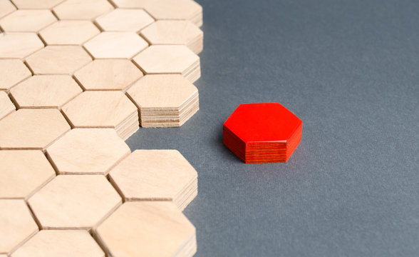 Red item is disconnected from other items. Hexagons. The concept of separating parts from a whole or connecting parts to a whole. Business process, logical structure, perfectionism. Creating new.