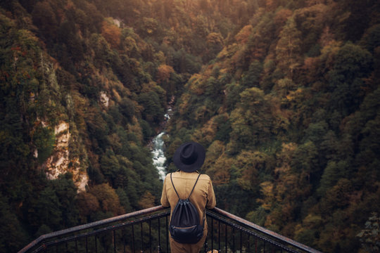 woman standing on edge