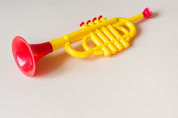 Children trumpet made of colored plastic © Kiryakova Anna