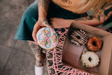 person holding donut