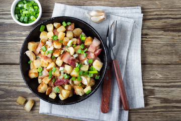 Traditional dish of Spanish cuisine - migos from bread. Top view.