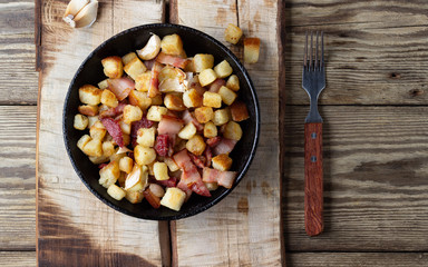 Traditional dish of Spanish cuisine - migos from bread. Top view.