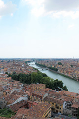 Fototapeta na wymiar Panorama of Verona Italy with a view of the red roofs of the old town and the tower