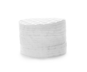 Stack of cotton pads on white background