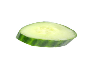 Cut fresh green cucumber on white background