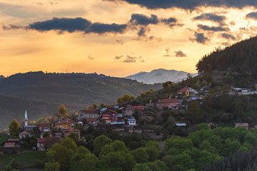 Spring sunset over Sveta Petka village in Rhodope mountain, Bulgaria