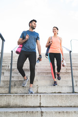 Beautiful Couple Going Together to the Gym.