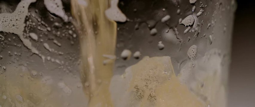 pour beer into glass