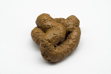 Droppings in the foreground on a white background