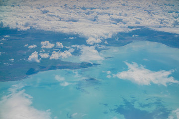 top view of the clouds and the sea from the plane