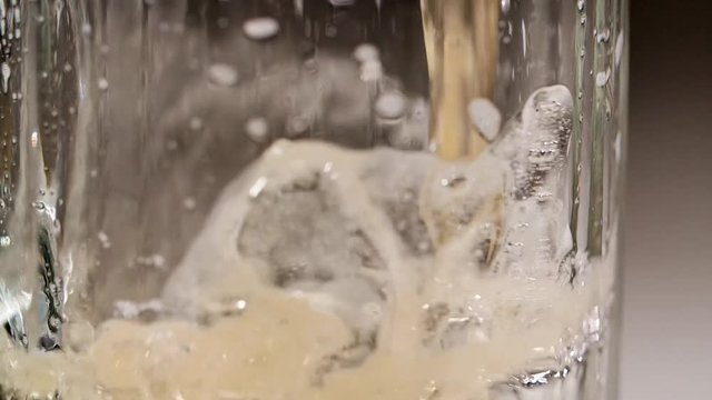 pour beer into glass