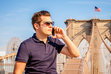 Businessman handsome male model talking on his cell phone