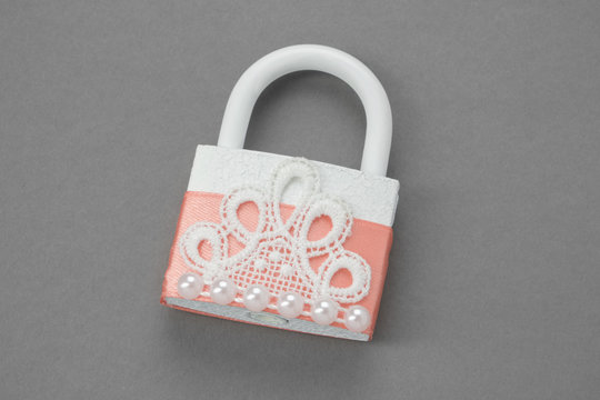 Ornate wedding Padlock decorated with lace and pearls.