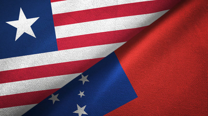 Liberia and Samoa two flags textile cloth, fabric texture
