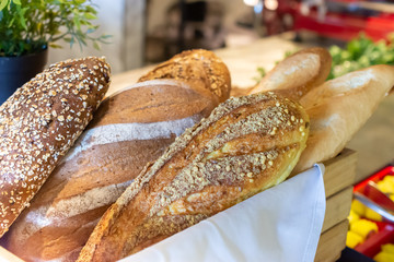 Fresh bread in the basket on table