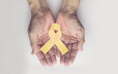 Childhood cancer awareness gold ribbon