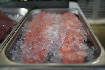 Fresh meat  in the refrigerator. Meat in the ice