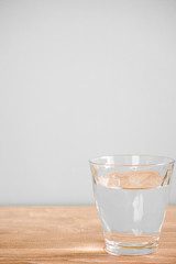 Glass of water on the table. テーブルの上のグラス一杯の水