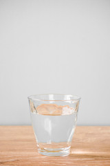 Glass of water on the table. テーブルの上のグラス一杯の水