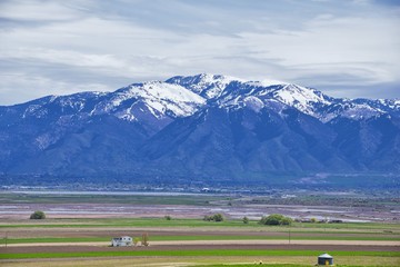 Tremonton and Logan Valley landscape views from Highway 30 pass, including Fielding, Beaverdam, Riverside and Collinston towns, by Utah State University, in Cache County along the Wasatch Front Range  © Jeremy