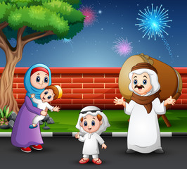 Happy family celebrate for eid mubarak in the park