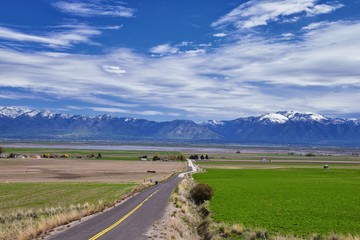 Tremonton and Logan Valley landscape views from Highway 30 pass, including Fielding, Beaverdam, Riverside and Collinston towns, by Utah State University, in Cache County along the Wasatch Front Range  © Jeremy