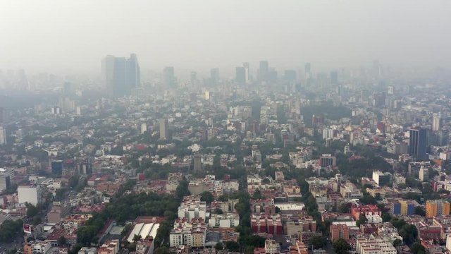 Aerial drone shot of Mexico City pollution