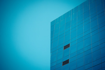 Modern office building with blue glass windows