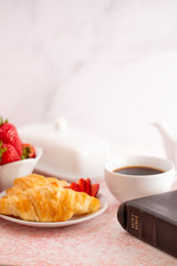 A Personal Bible Study at a Table Set for Breakfast