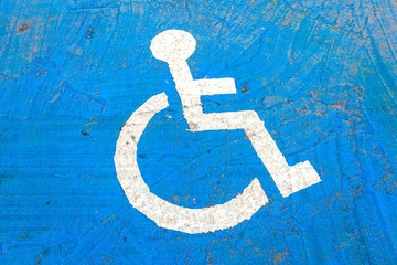 Symbol of disabled car park On the blue road