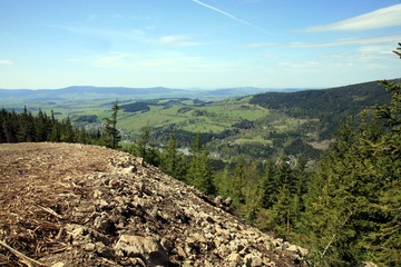 Beautiful panoramic view from the tourist attraction observation deck Stezka v oblacich or Sky Walk In the Czech village of Dolni Morava. Interesting places for tourism. View on czech mountain ranges.
