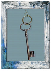 Clé de maison dans cadre vintage 