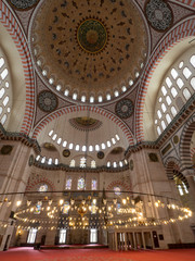 Fototapeta na wymiar STANBUL, TURKEY - Februay, 2019: An beautiful interior view of Suleymaniye Mosque (Suleymaniye Camisi), Istanbul, Turkey. The foundation date as 1550 and the inauguration date as 1557