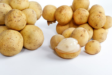 Lansium parasiticum langsat lanzones on white background