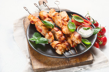 Grilled chicken on skewers