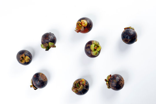 Mangosteen fruit on white background
