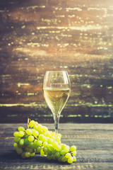 White wine on the rustic background. Selective focus. Shallow depth of field.