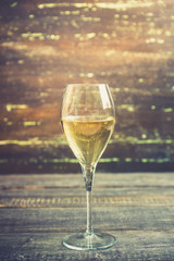 White wine on the rustic background. Selective focus. Shallow depth of field.