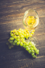 White wine on the rustic background. Selective focus. Shallow depth of field.