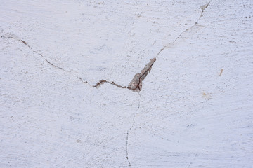 Texture, wall, concrete, it can be used as a background. Wall fragment with scratches and cracks