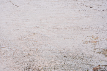 Texture, wall, concrete, it can be used as a background. Wall fragment with scratches and cracks