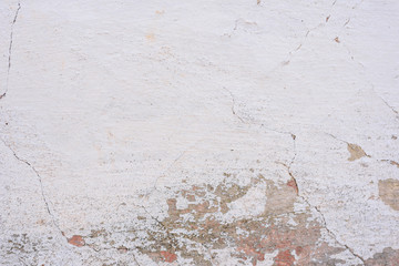 Texture, wall, concrete, it can be used as a background. Wall fragment with scratches and cracks