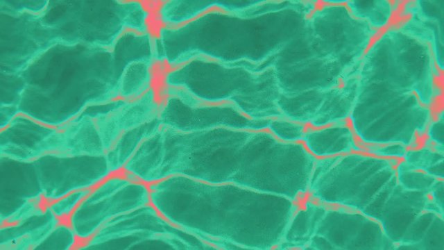 Green and pink texture with fluctuating waves of light. Light waves and clusters in motion.  Blurry crumpled surface distortion in  complementary colors.