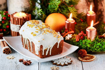 Christmas gingerbread cake among traditional decorations.