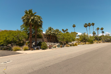 a street of Palm Springs with a house 1