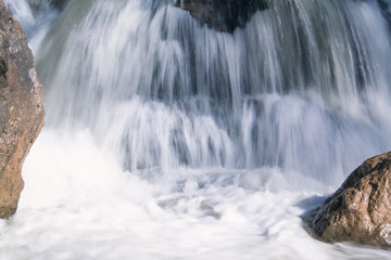 The small waterfall with a rocks.